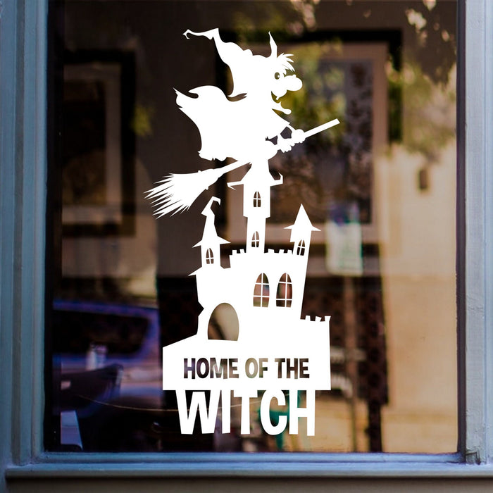Home of the Witch Halloween Window Sticker shown on a shop window