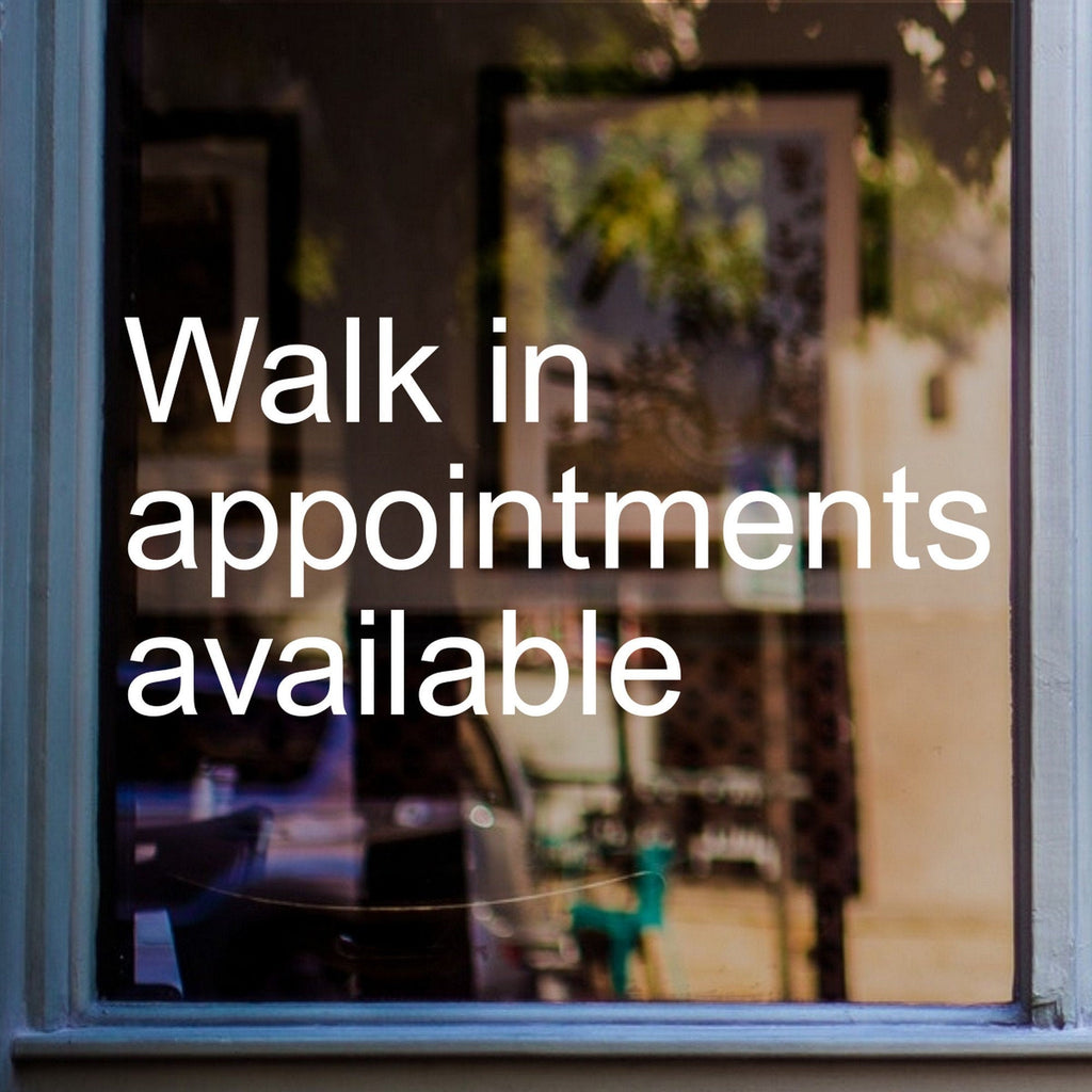 Walk-In Appointments Available Window Sticker displayed on a shop window