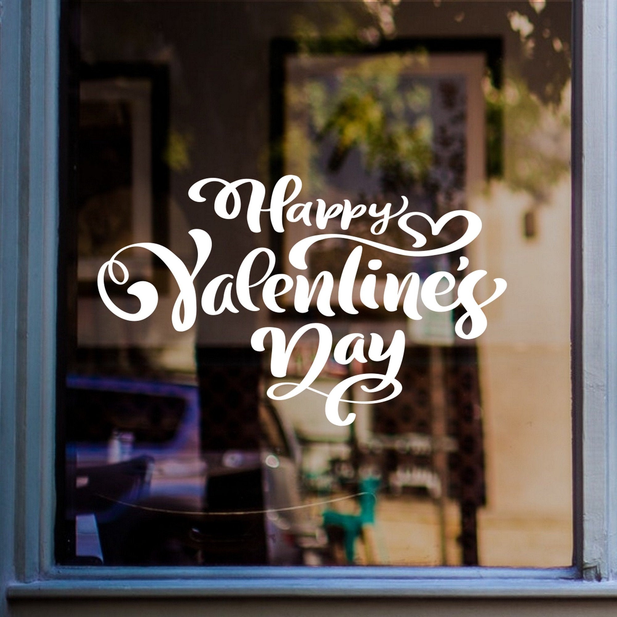 Valentine’s Day Shop Window Sticker shown on a shop window