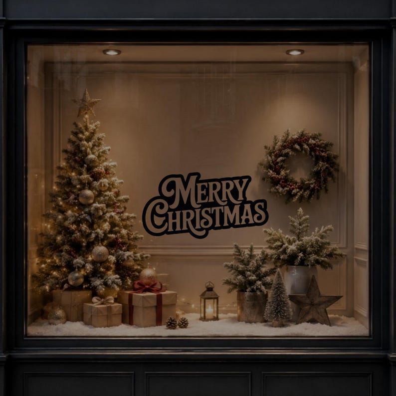 White Merry Christmas vinyl decal displayed on a dark window with festive decorations in the background.