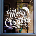 Merry Christmas window sticker with Santa hat and decorative lettering displayed in white vinyl on glass.