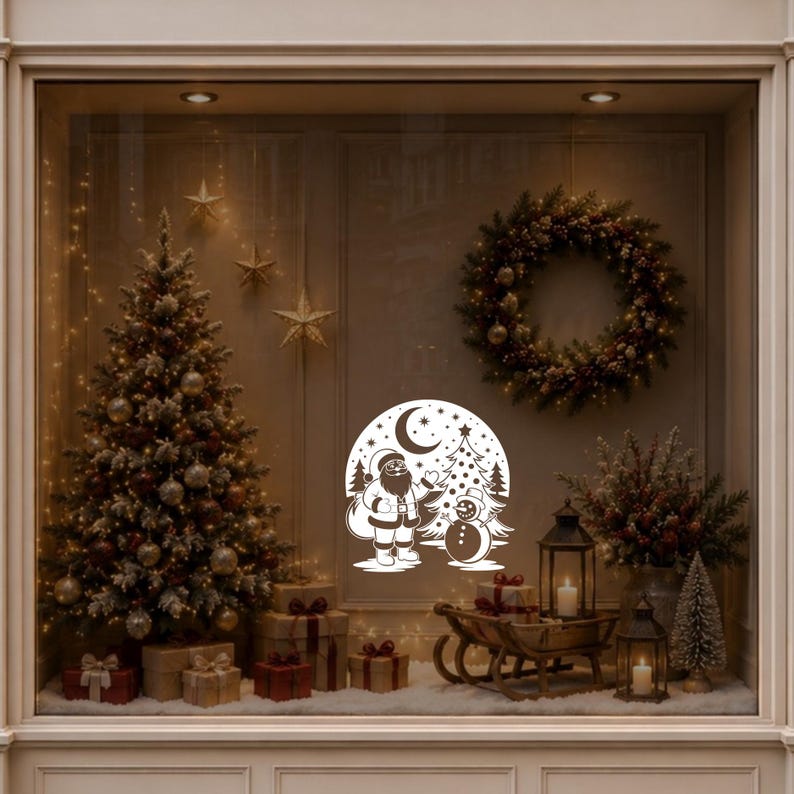 Santa and snowman Christmas window decal displayed on a warmly decorated festive shop window.