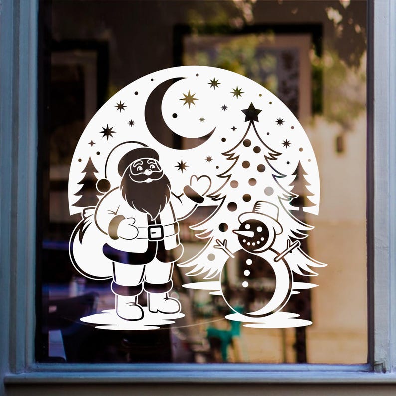 Santa and snowman Christmas window sticker with snowy trees, stars and a crescent moon displayed on glass.