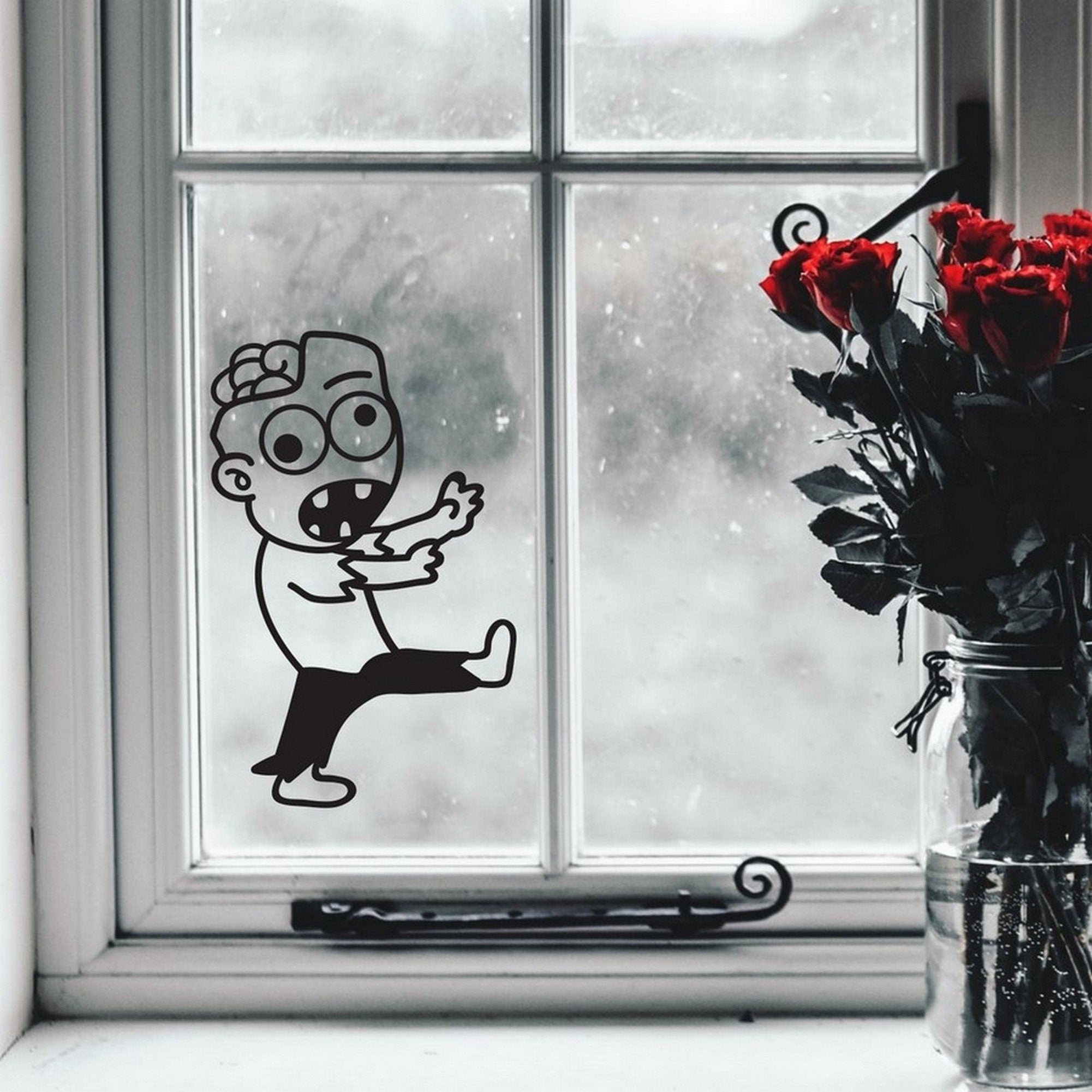 Zombie Halloween window sticker shown applied to glass