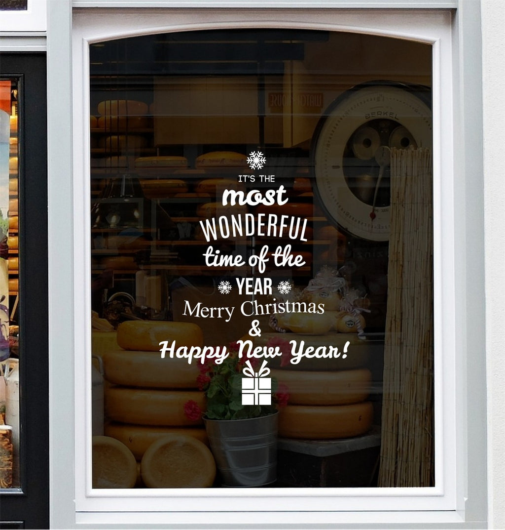 It's the Most Wonderful Time of the Year Christmas decal displayed on a festive shop window