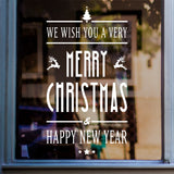 We Wish You A Very Merry Christmas Sticker in shop window