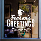 Season's Greetings Christmas Sticker in shop window