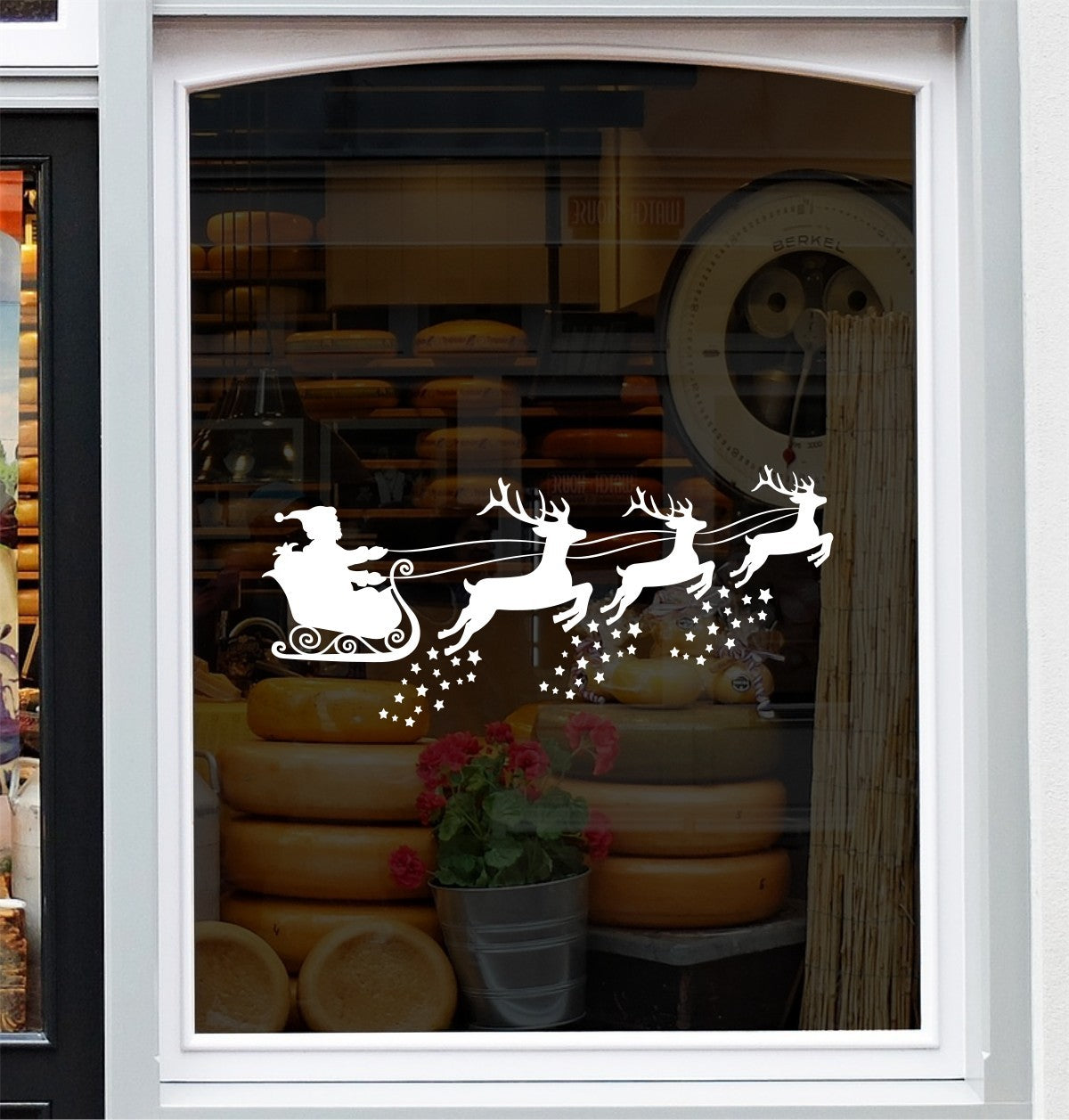 Santa sleigh and reindeer Christmas vinyl window sticker design with stars