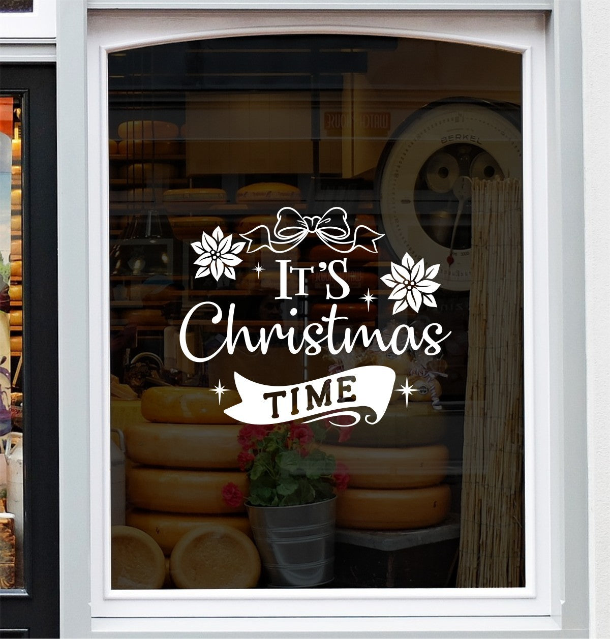 White It's Christmas Time festive vinyl decal on a window