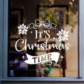 White It's Christmas Time vinyl sticker displayed on a shop window