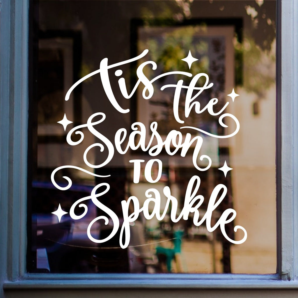 White Tis The Season To Sparkle Christmas window decal on a shop window